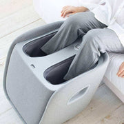REI Foot and Calf Massager in use with person seated