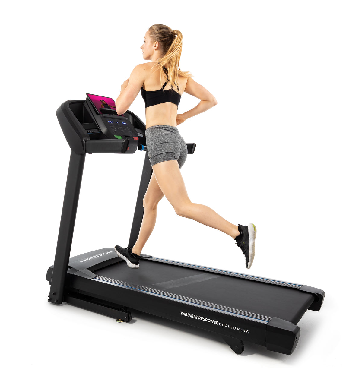 Horizon T101 Treadmill side view with woman running