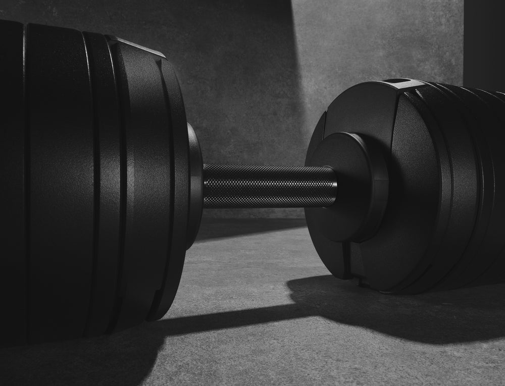 SMRTFT Nuobell Adjustable Dumbbell 100 lb Black SMRTFT Dumbbells smrtft-adjustable-dumbbell-100lb-detail-plate_68c5c1db-1311-4d3e-bcb0-60c6f6b6c261